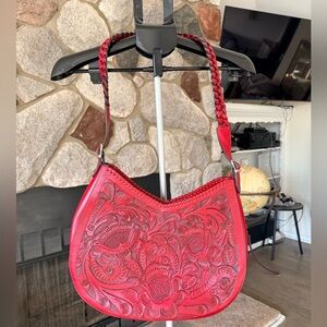 Hand tooled leather shoulder bag